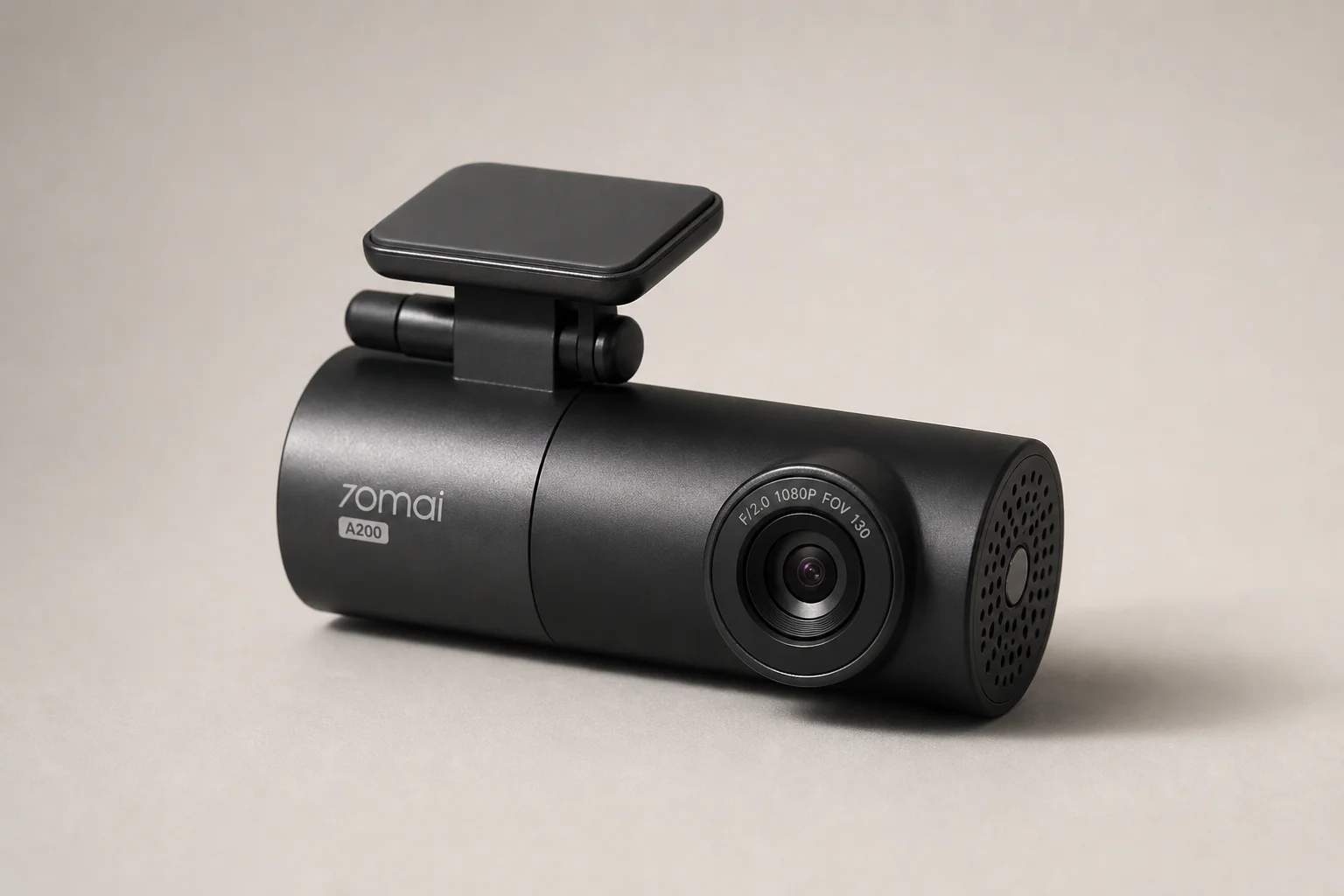 Three 70mai dash cameras A200, A510, and A810 arranged by size on grey surface