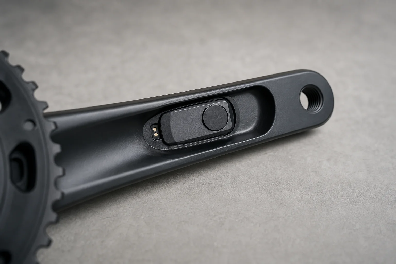 Close-up of left crank arm with power meter sensor installed