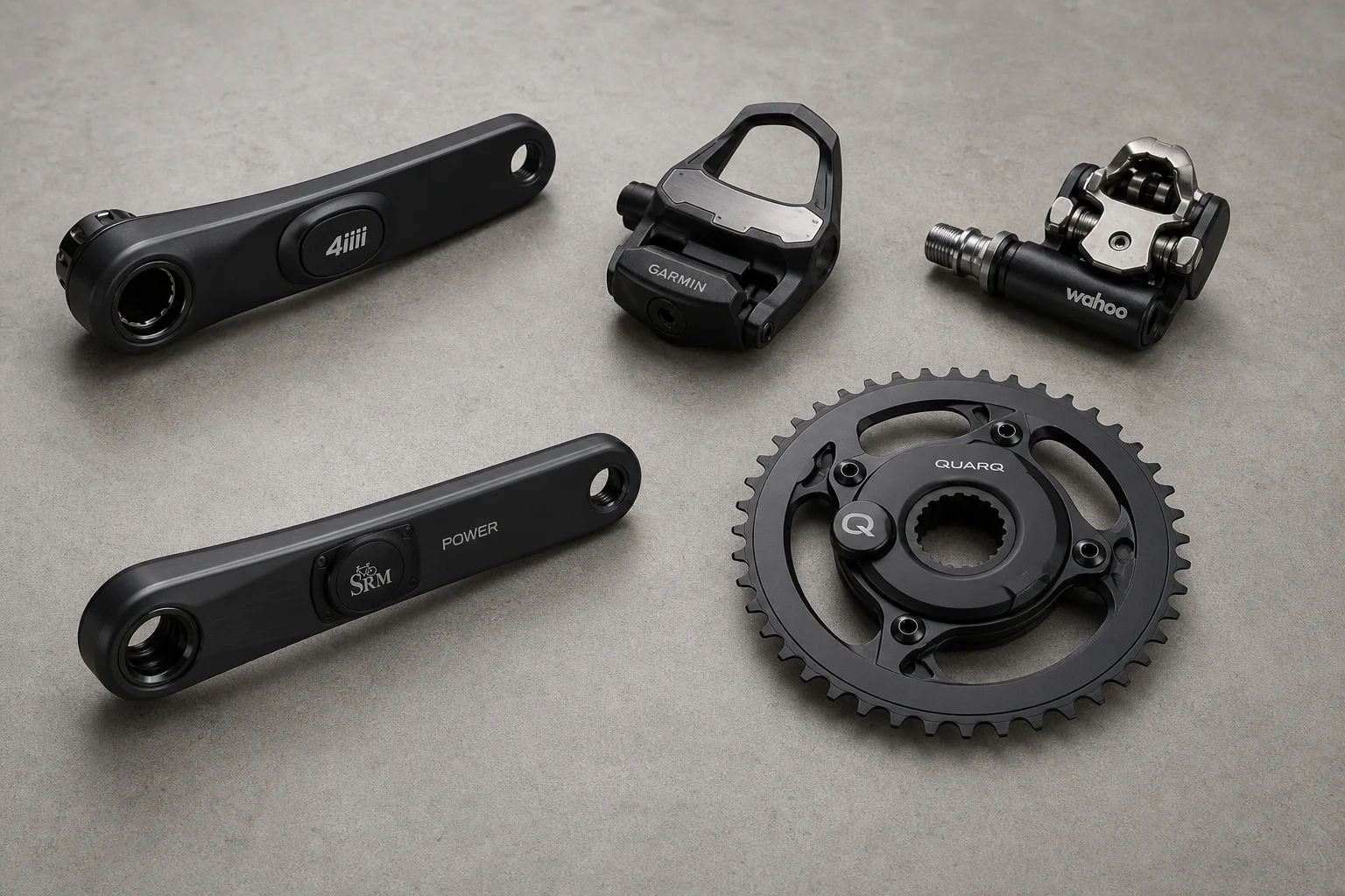 Five affordable power meter products displayed on concrete surface