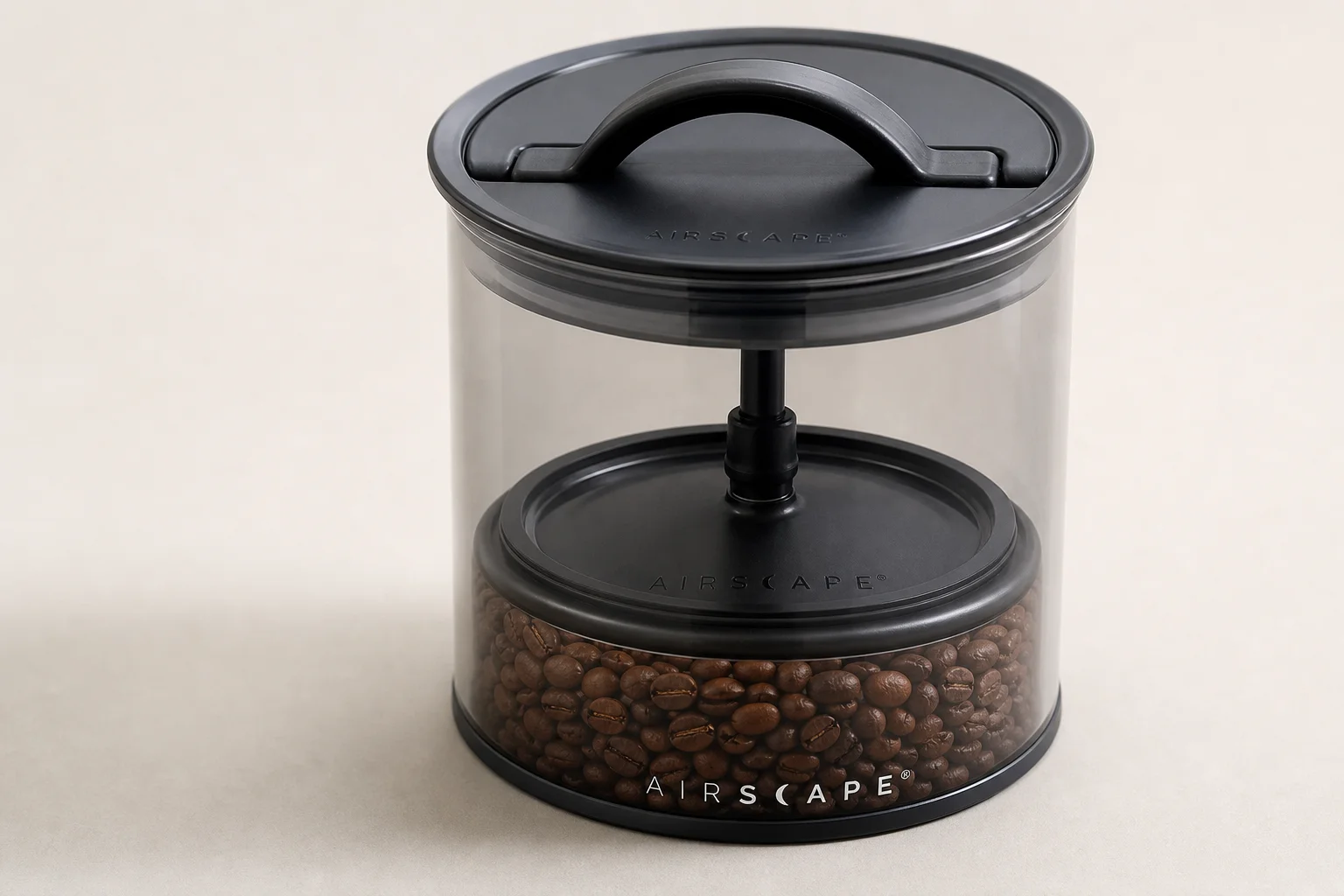 Eleven coffee storage containers arranged by category on concrete surface