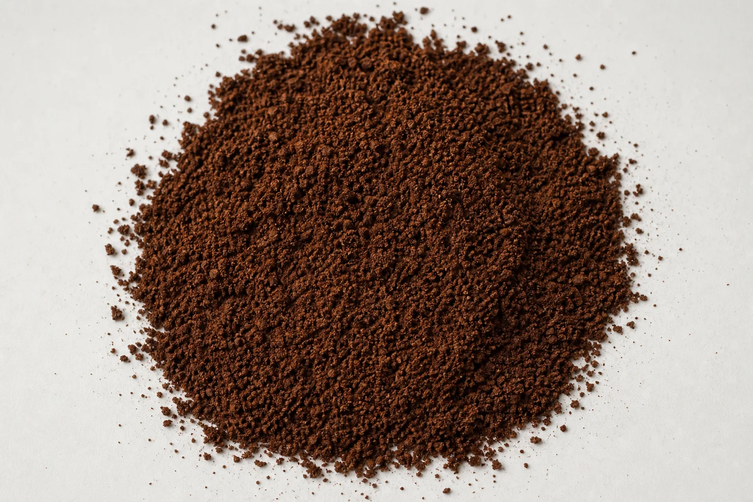 Freshly ground coffee at medium-fine setting showing fluffy texture and consistency