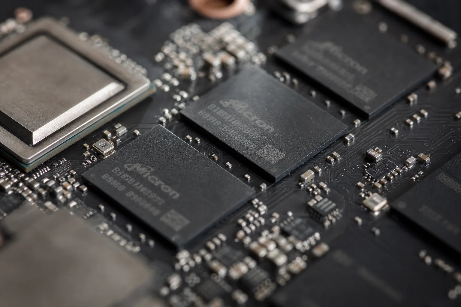 Close-up of circuit board components and memory chips on an Android TV box motherboard
