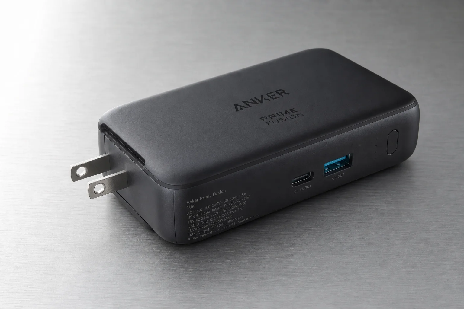 Six Anker power banks arranged on concrete surface showing size and design differences