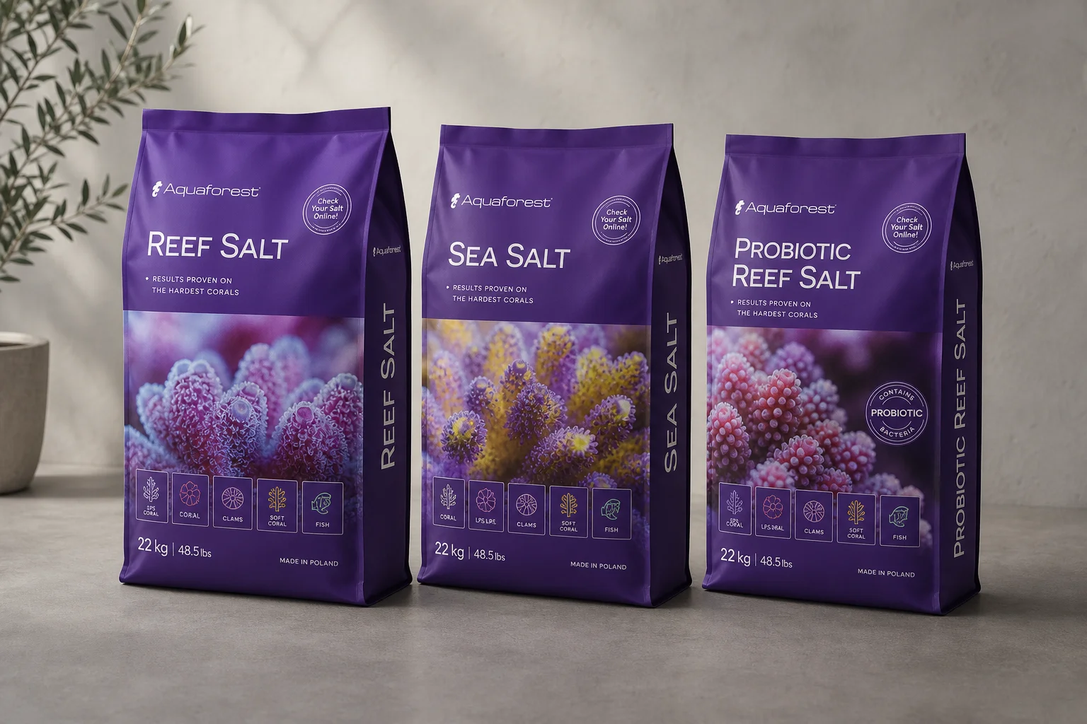 Three Aquaforest salt mix bags displayed on concrete surface