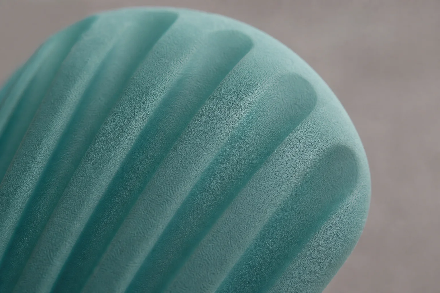 Close-up of ice pack surface showing textured deep groove design pattern