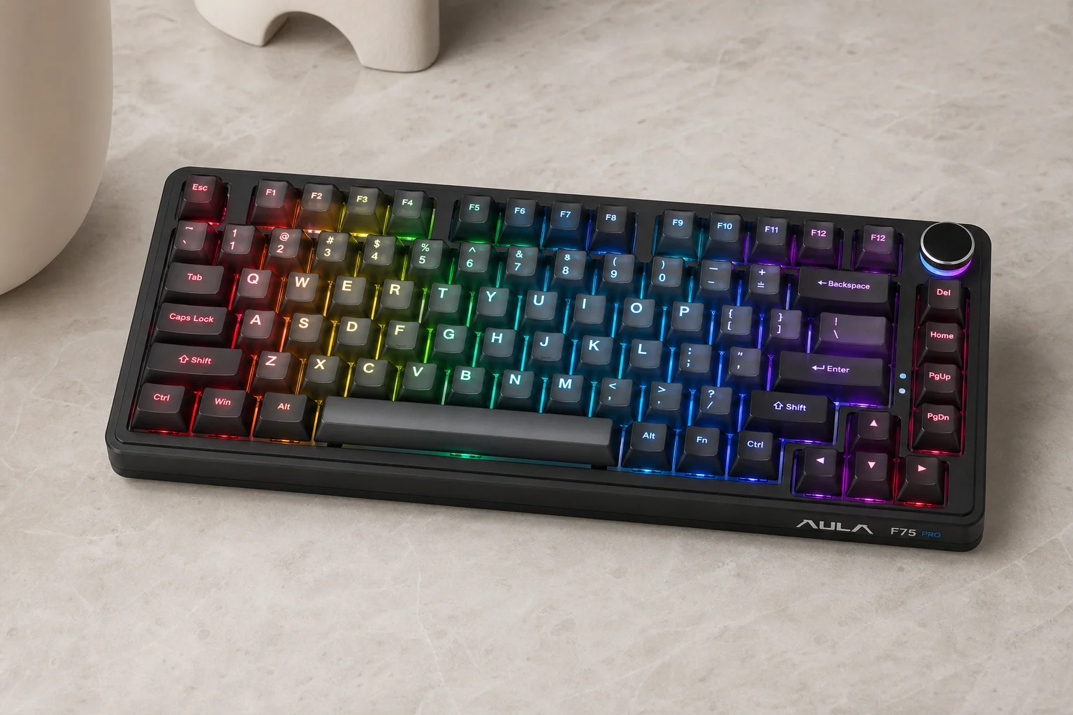 Six budget mechanical keyboards arranged on concrete surface showing variety of styles and colors
