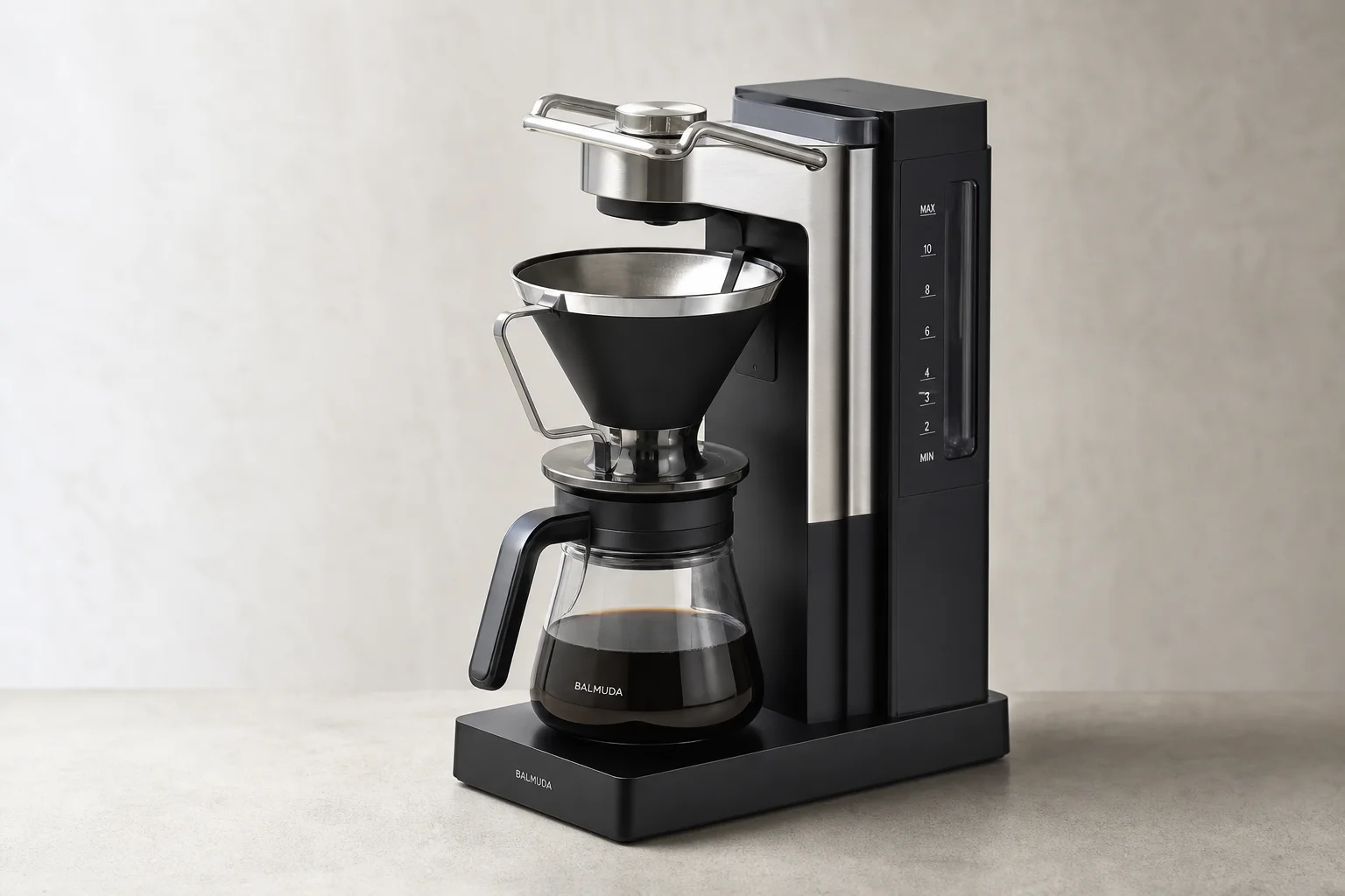 Seven coffee makers arranged on concrete surface representing different brewing styles