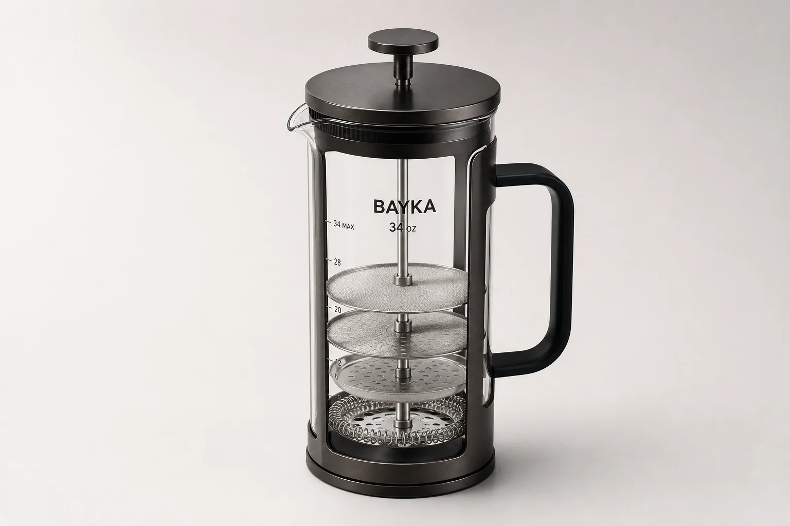 Five French press coffee makers arranged on concrete surface showing different sizes and styles