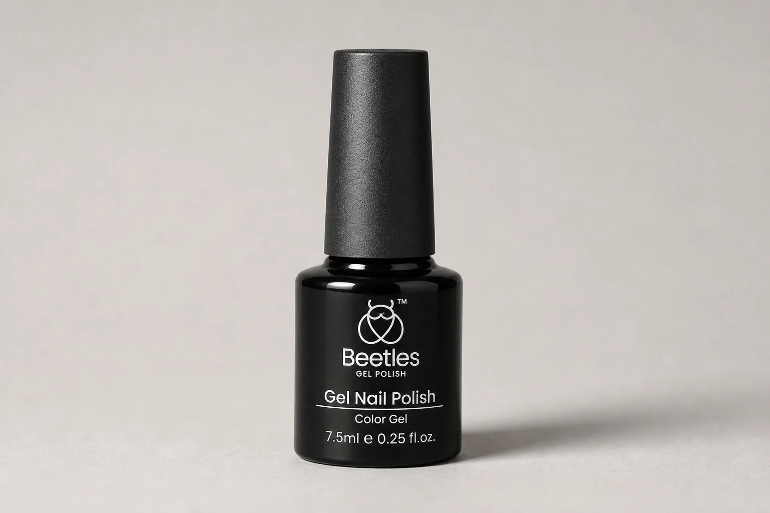Gel polish bottles ranging from budget to premium brands arranged on marble surface