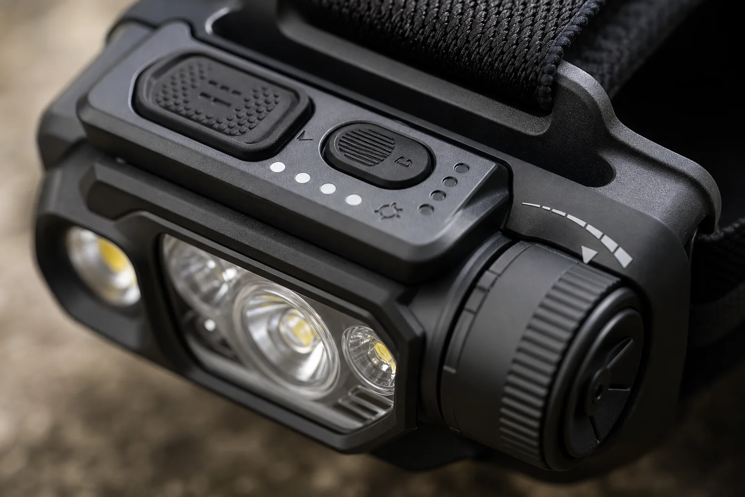 Close-up of headlamp control buttons and light beam adjustment interface