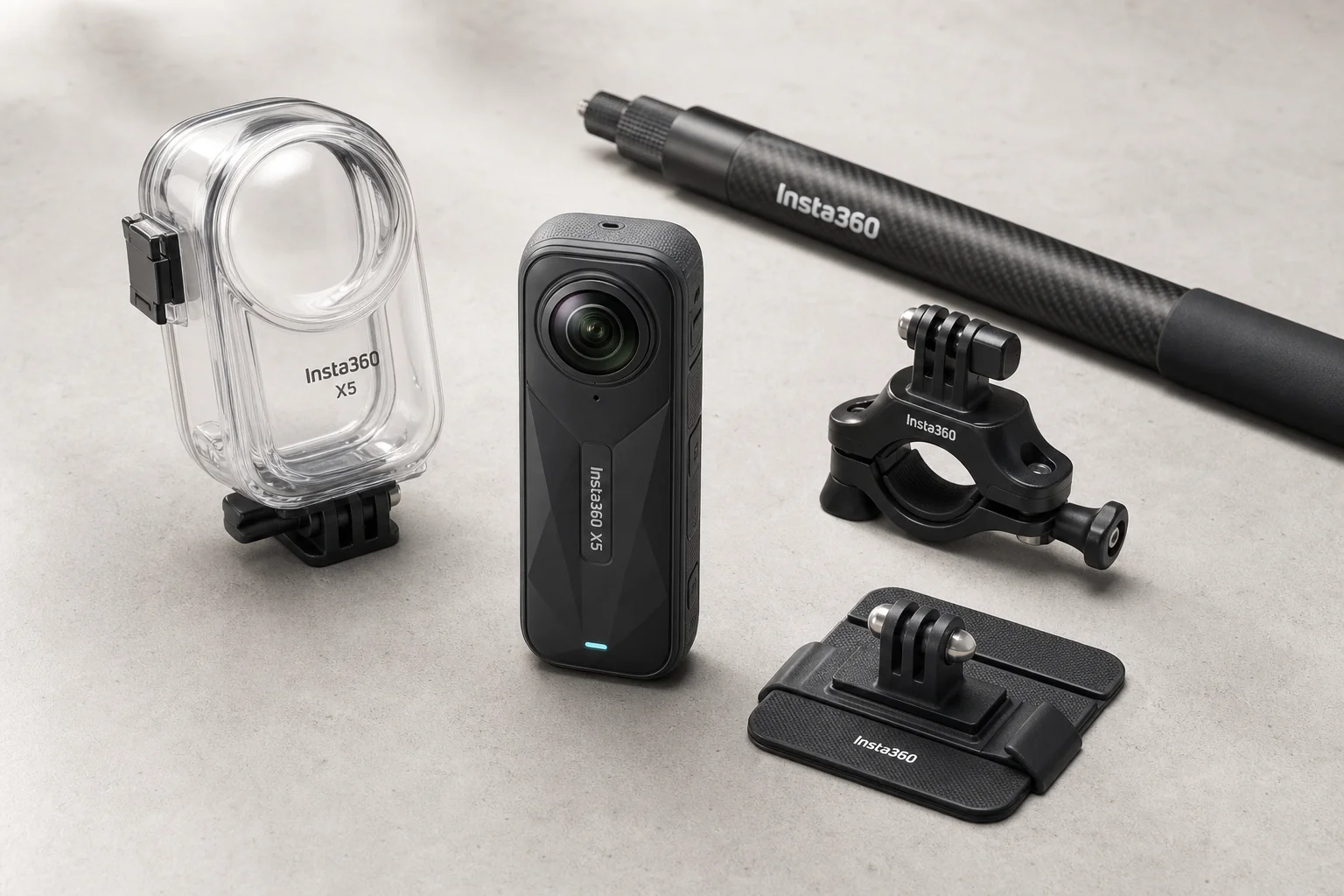 Insta360 X5 camera with mounts and accessories on concrete surface