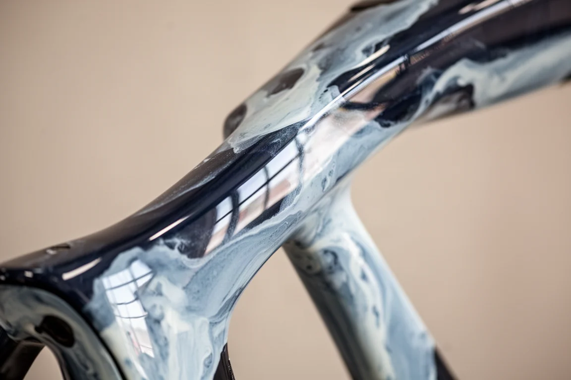 Extreme close-up of an aero frame with marbled water-transfer paint