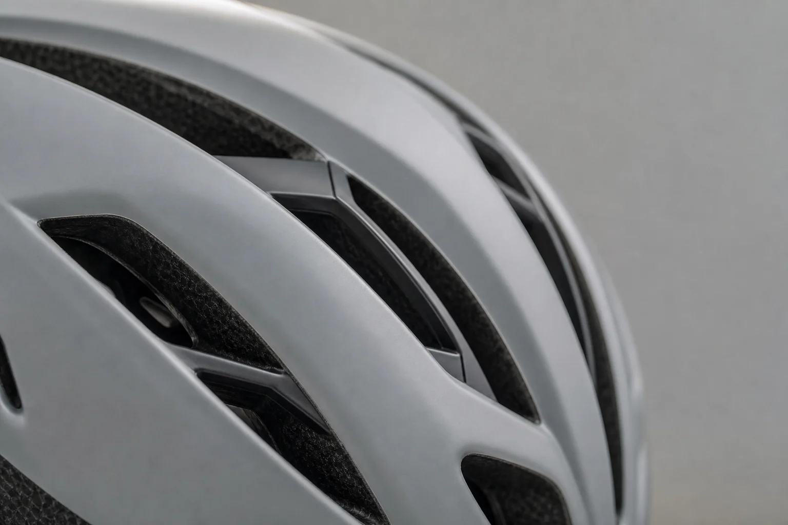 Close-up of helmet ventilation holes and aerodynamic design detail