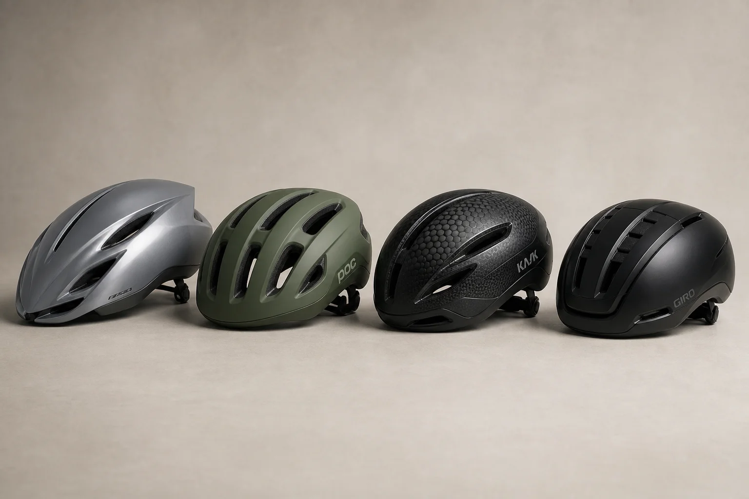 Four premium road cycling helmets displayed in a row on neutral backdrop