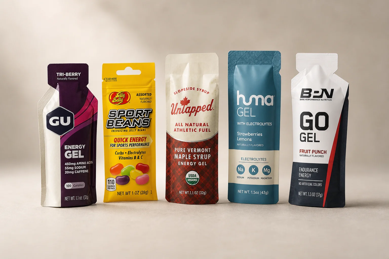 Five running gel products arranged in a row on neutral backdrop