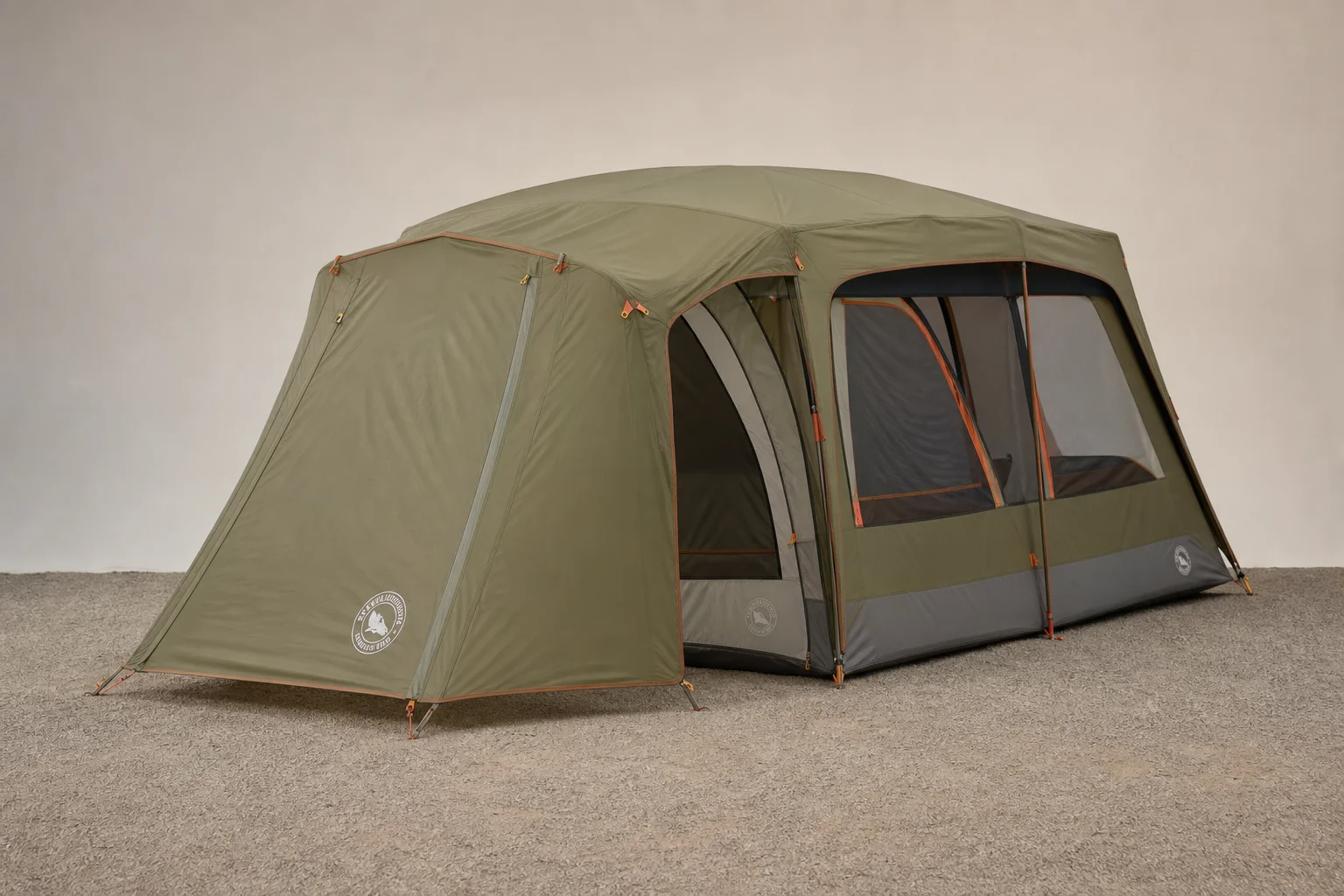 Six camping tents of varying sizes and styles arranged on a grey surface