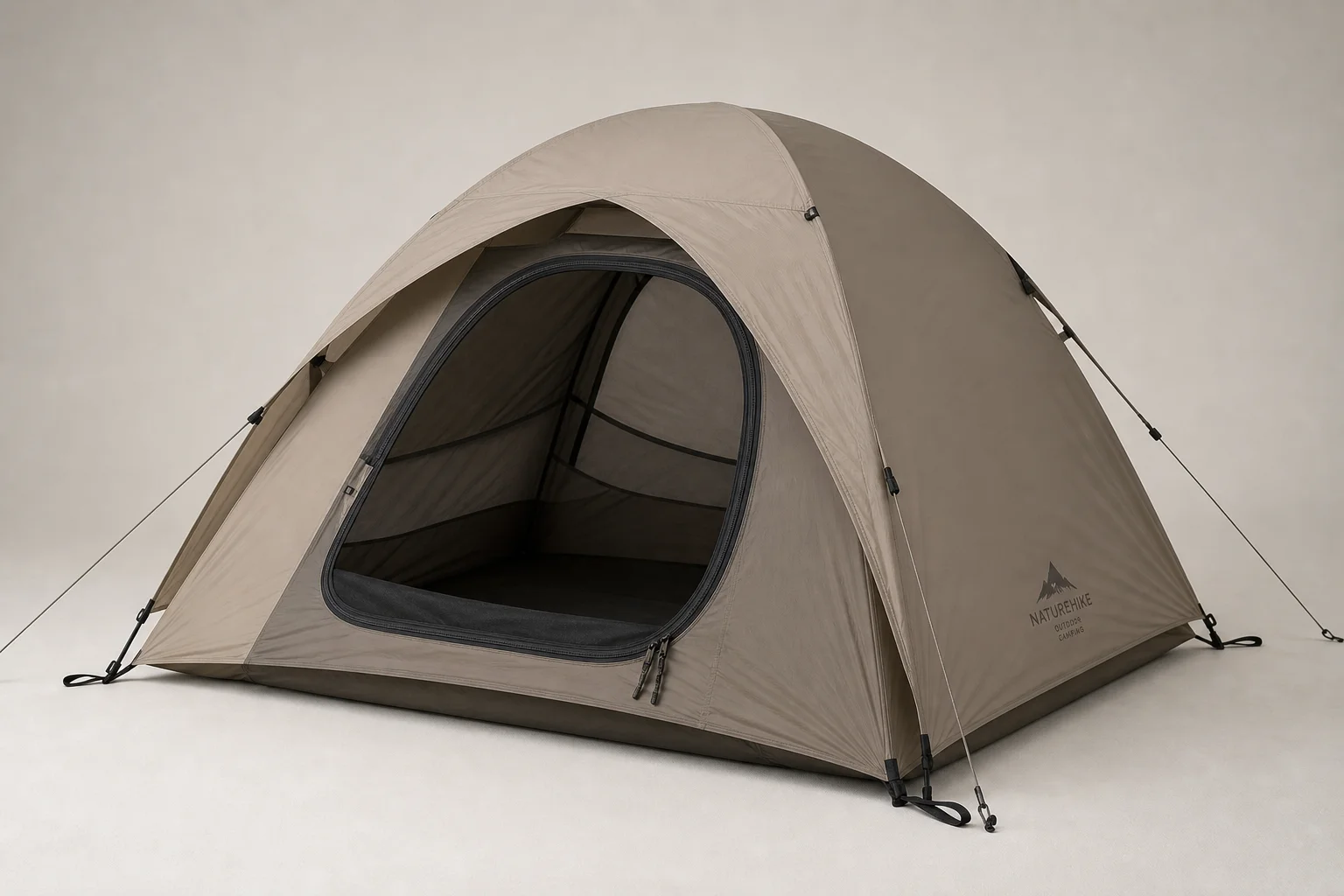 Five ultralight tents displayed on concrete surface showing variety of designs and colors