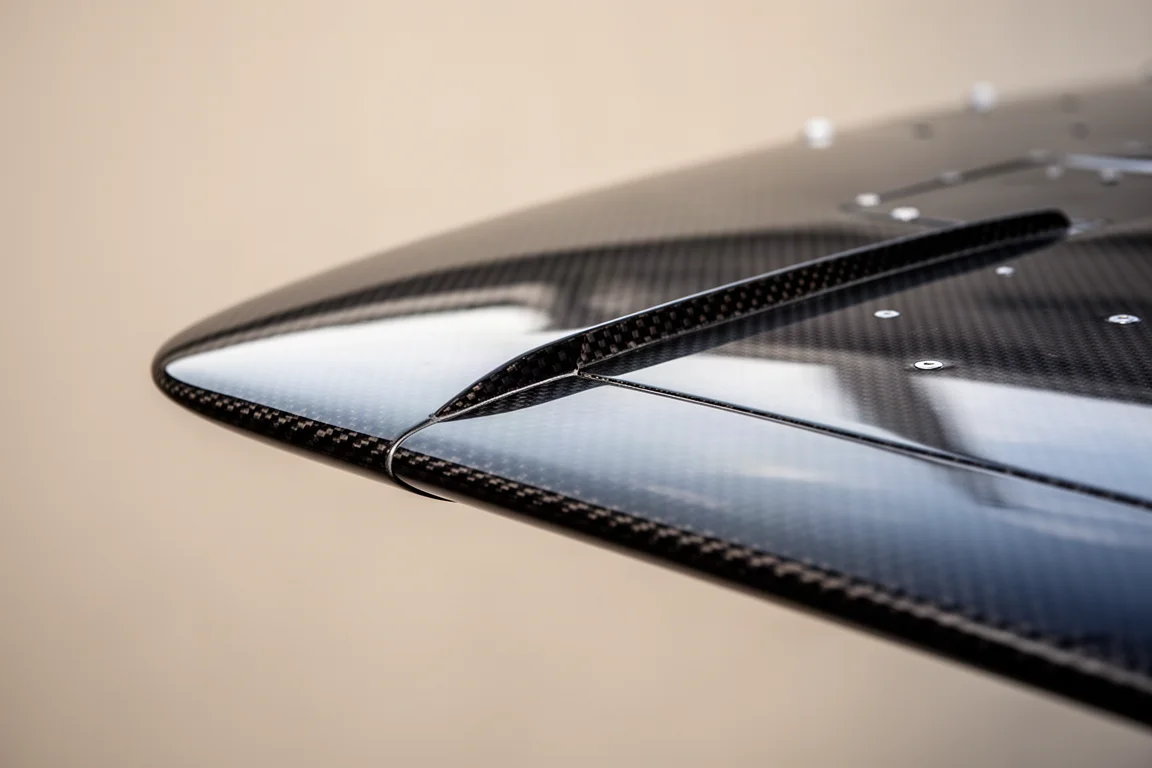 Close-up of a stall fence along the leading edge of a carbon fiber wing