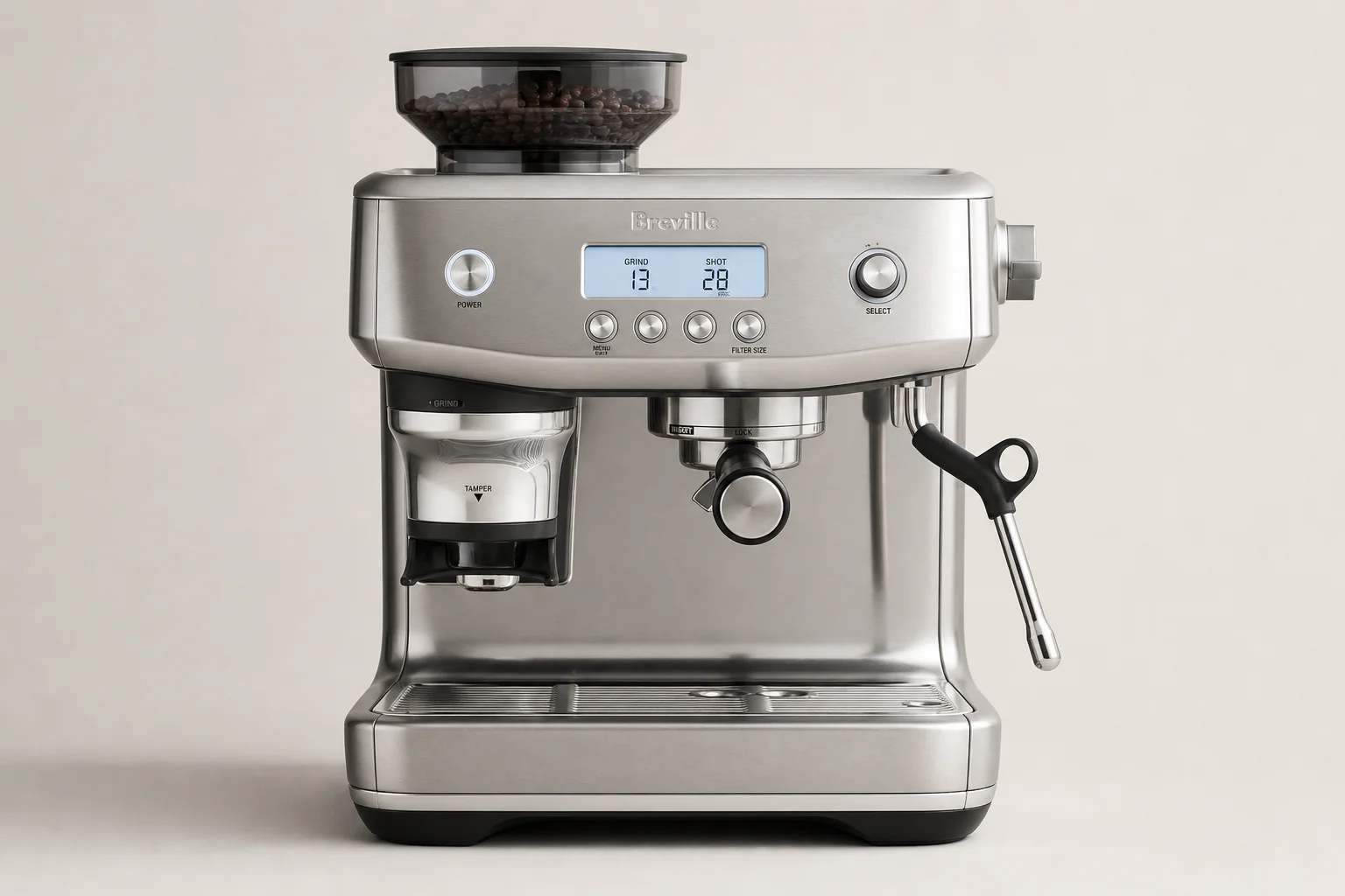 Four espresso machines displayed side by side on concrete surface
