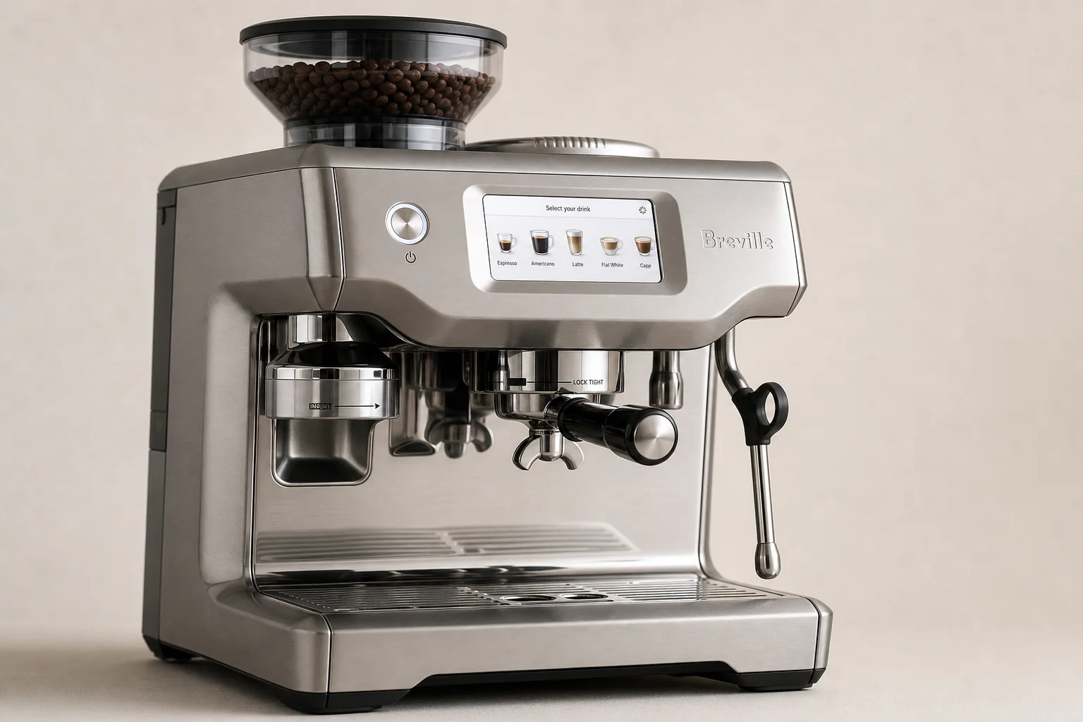 Ninja Luxe Cafe and Breville espresso machines arranged on grey surface