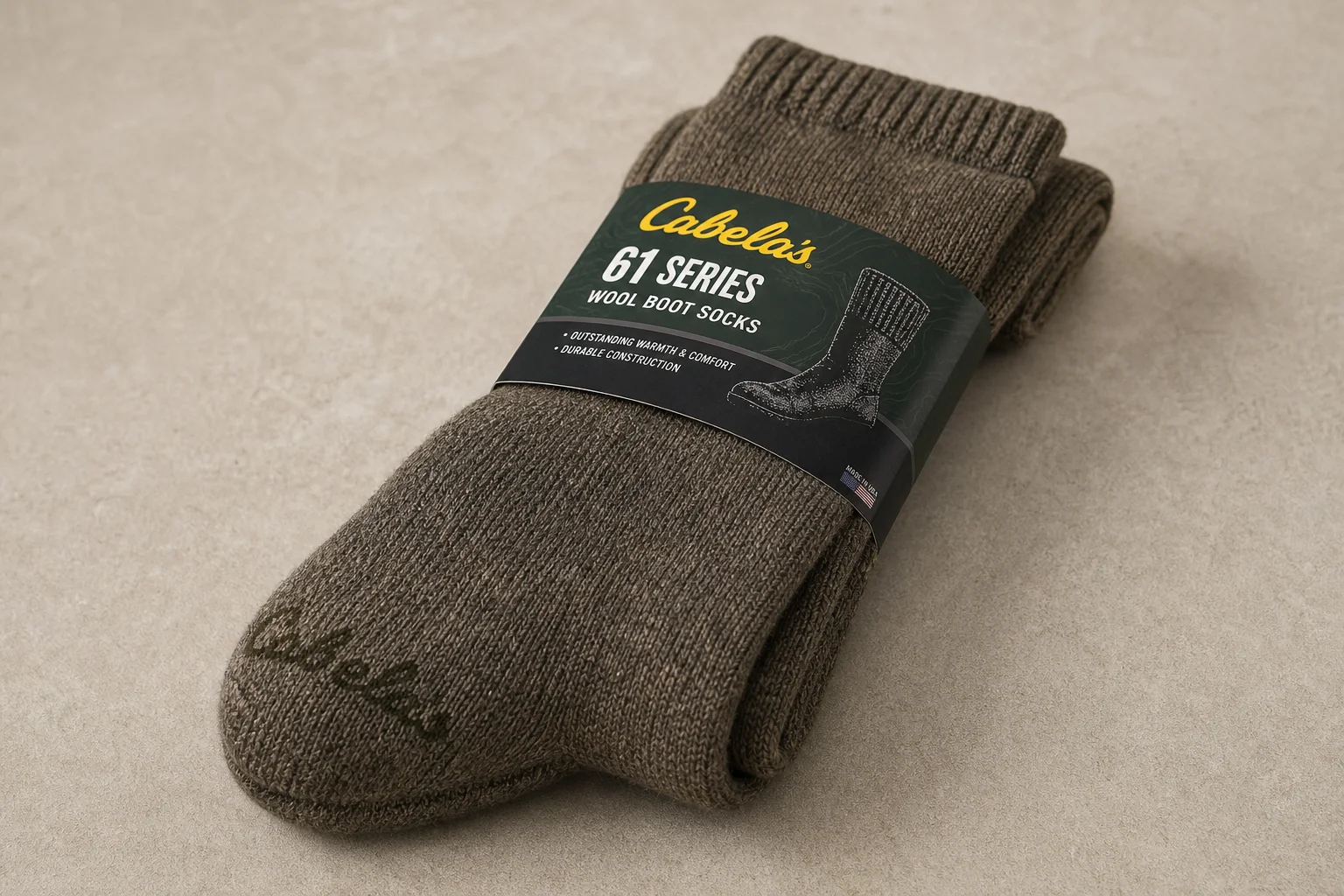 Winter hiking boot setup with pac boots, socks, gaiters, and booties on snow