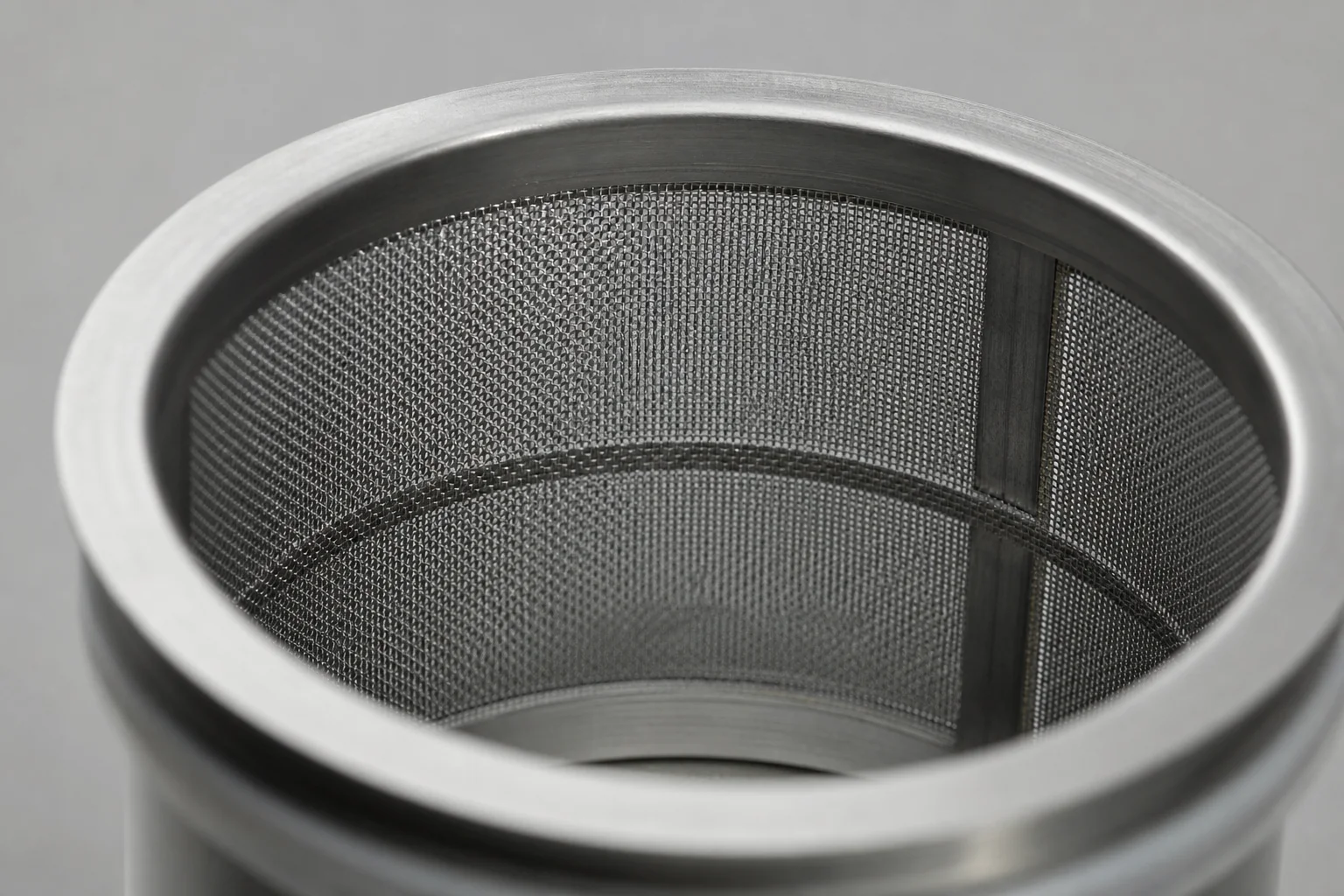 Close-up of double-mesh filter interior showing fine mesh weave