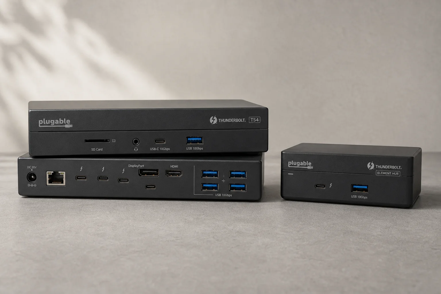CalDigit TS4 and Element Hub Thunderbolt docks on concrete surface