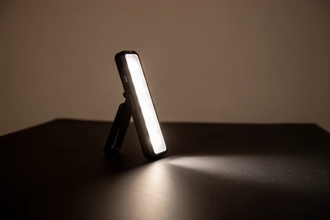 Flood light side of a slim bar light illuminating a dark surface
