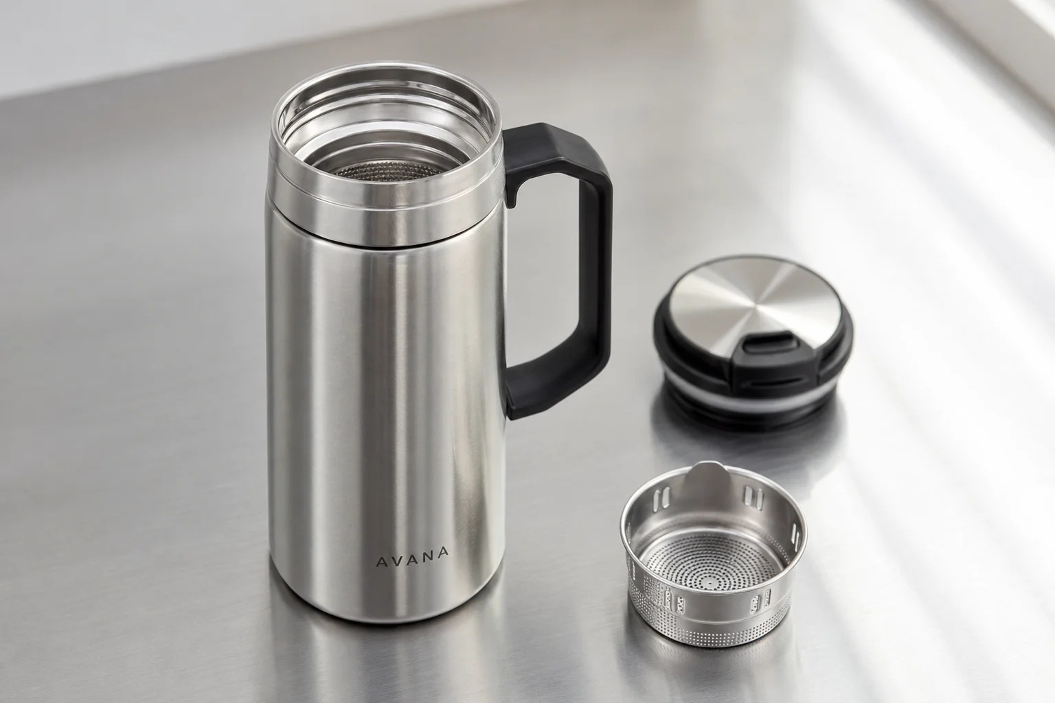 Five portable coffee makers arranged on concrete: Zyliss mug, Coffee Gator travel mug, Espro press, Bodum French press, and AeroPress Go