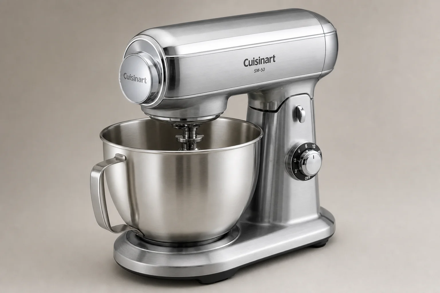 Five stand mixers in various styles and finishes arranged on concrete surface