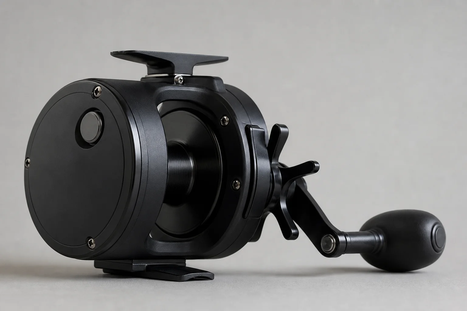 Three conventional fishing reels displayed side by side on neutral backdrop
