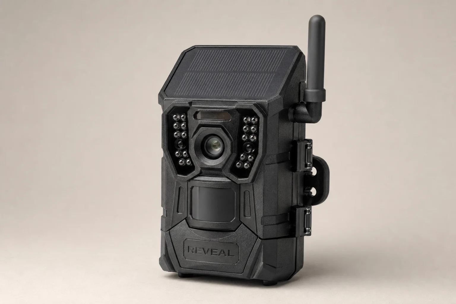Five trail cameras displayed on weathered wood surface