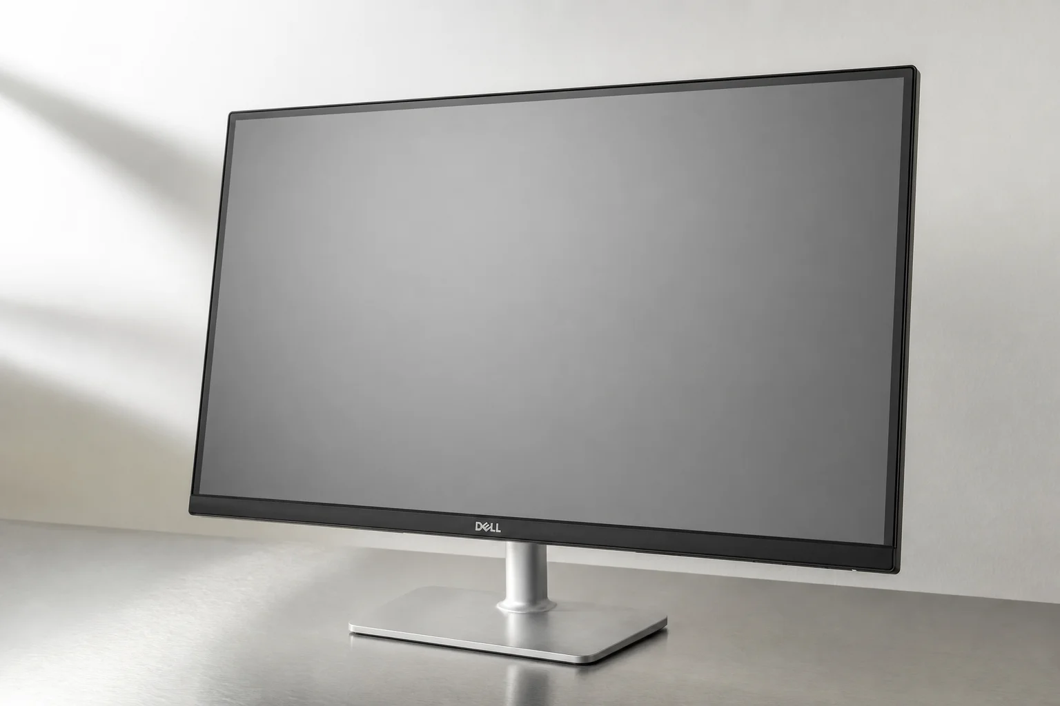 Eight computer monitors of varying sizes displayed on a concrete surface showing different content