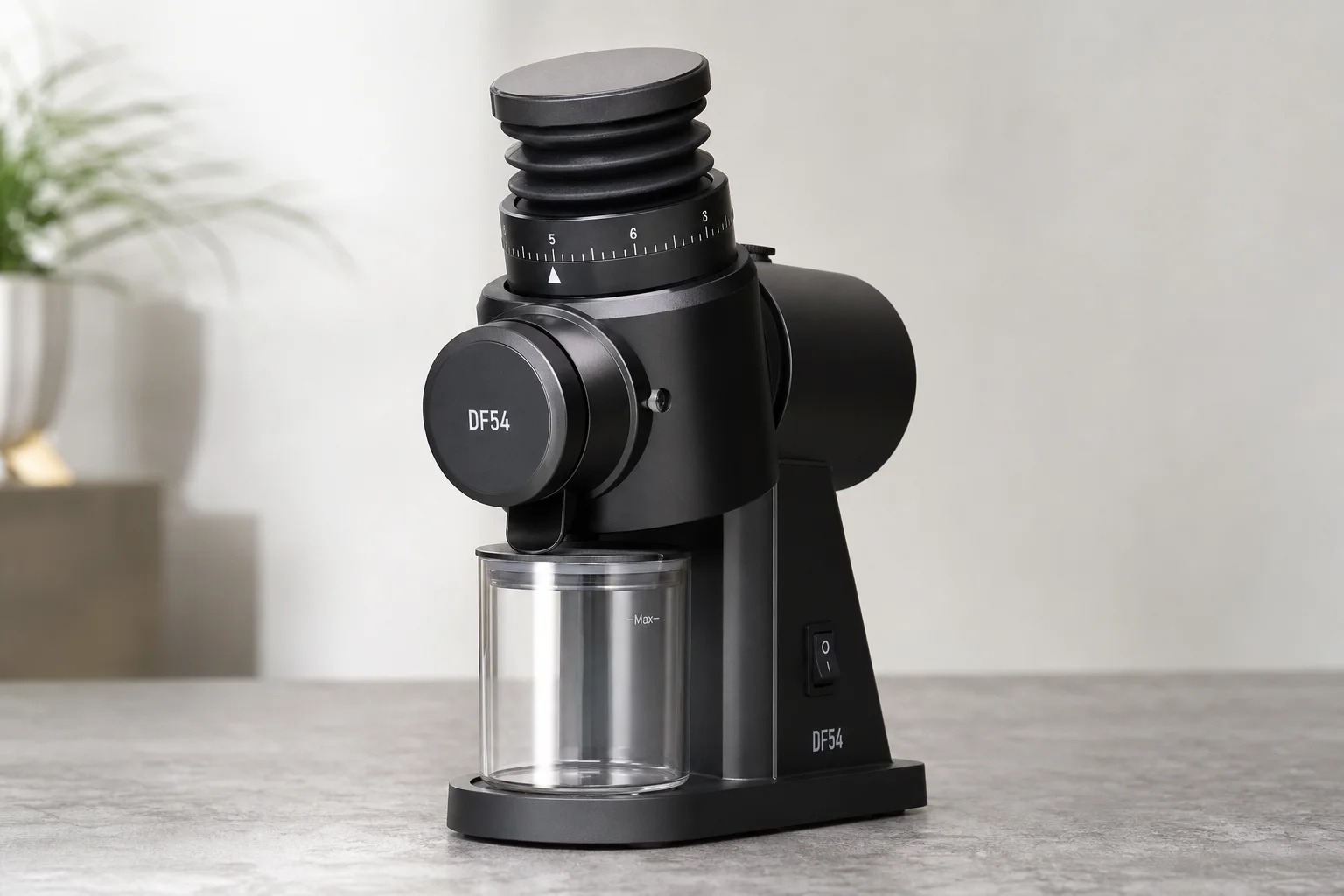 Five espresso grinders arranged in a row on concrete surface