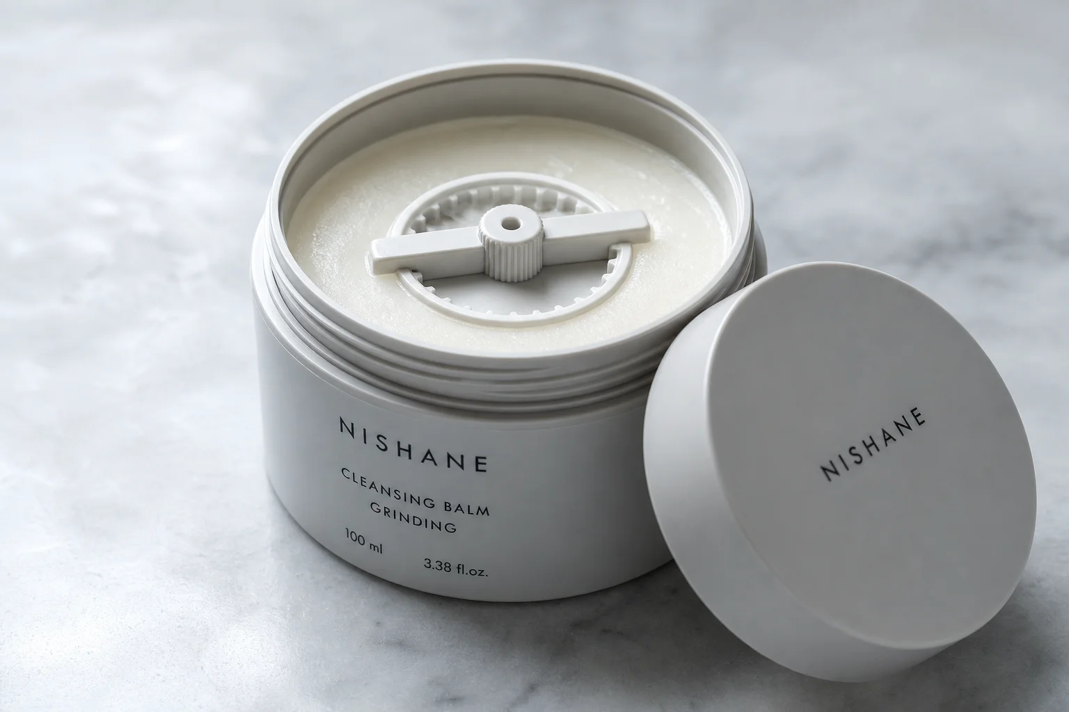 Collection of ten Korean beauty products arranged on marble surface