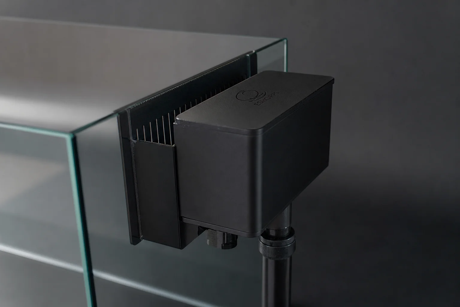 Eshopps Eclipse Overflow Box mounted on aquarium back panel with internal weir visible