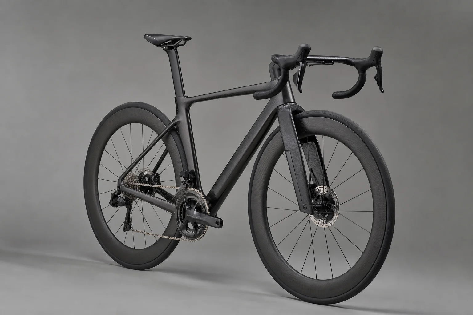 Factor One aero road bike in black with distinctive thin Bandit fork and integrated handlebars on grey backdrop