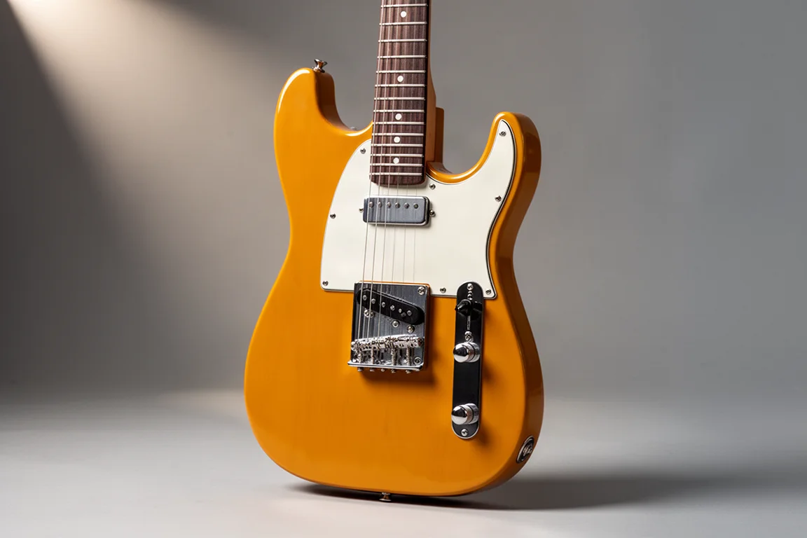 Gibson Les Paul e Fender Telecaster lado a lado sobre superfície de concreto