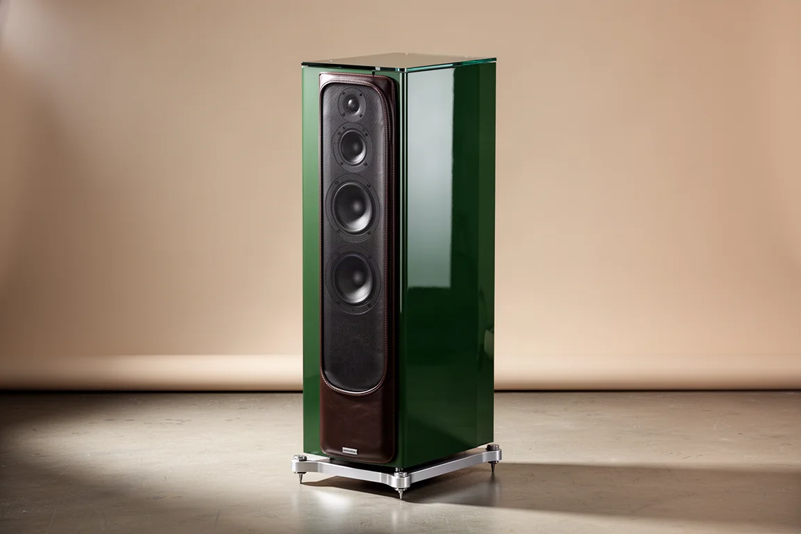 Slim floorstanding tower speaker in high gloss moss green on an aluminum plinth
