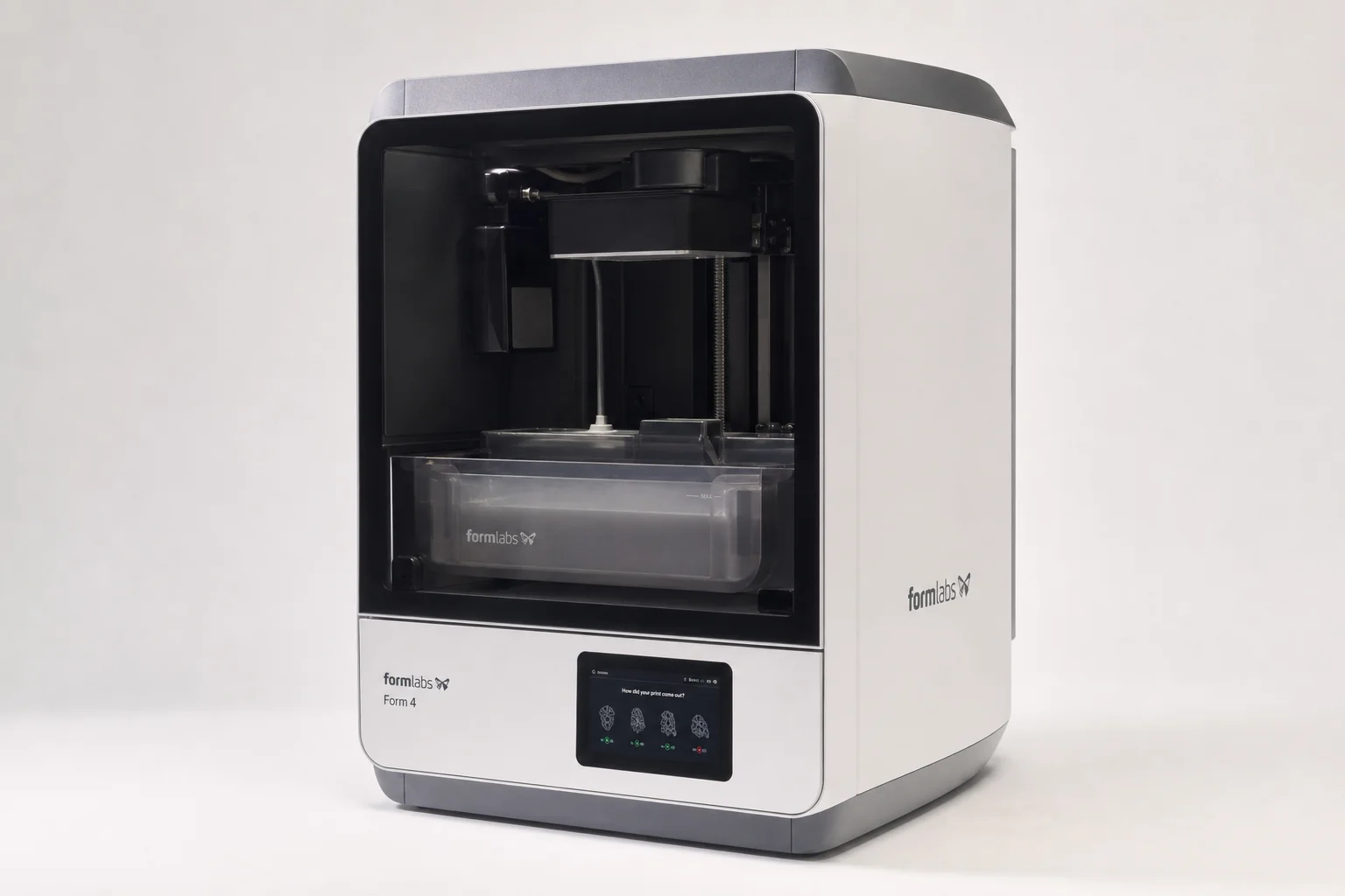 Six imprimantes 3D disposées par taille et capacité sur une surface en béton