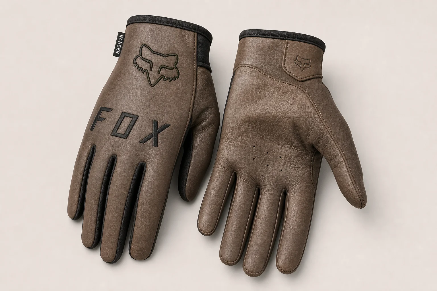 Fox Ranger und Fox Ranger Gel Handschuhe nebeneinander auf Beton