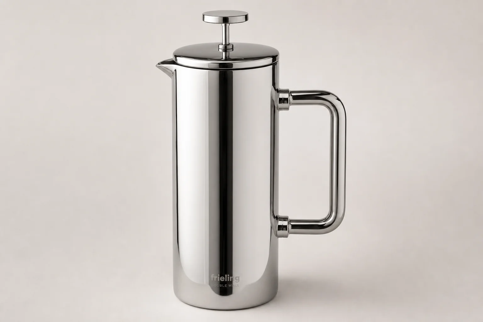 Five non-toxic French press coffee makers displayed on concrete surface