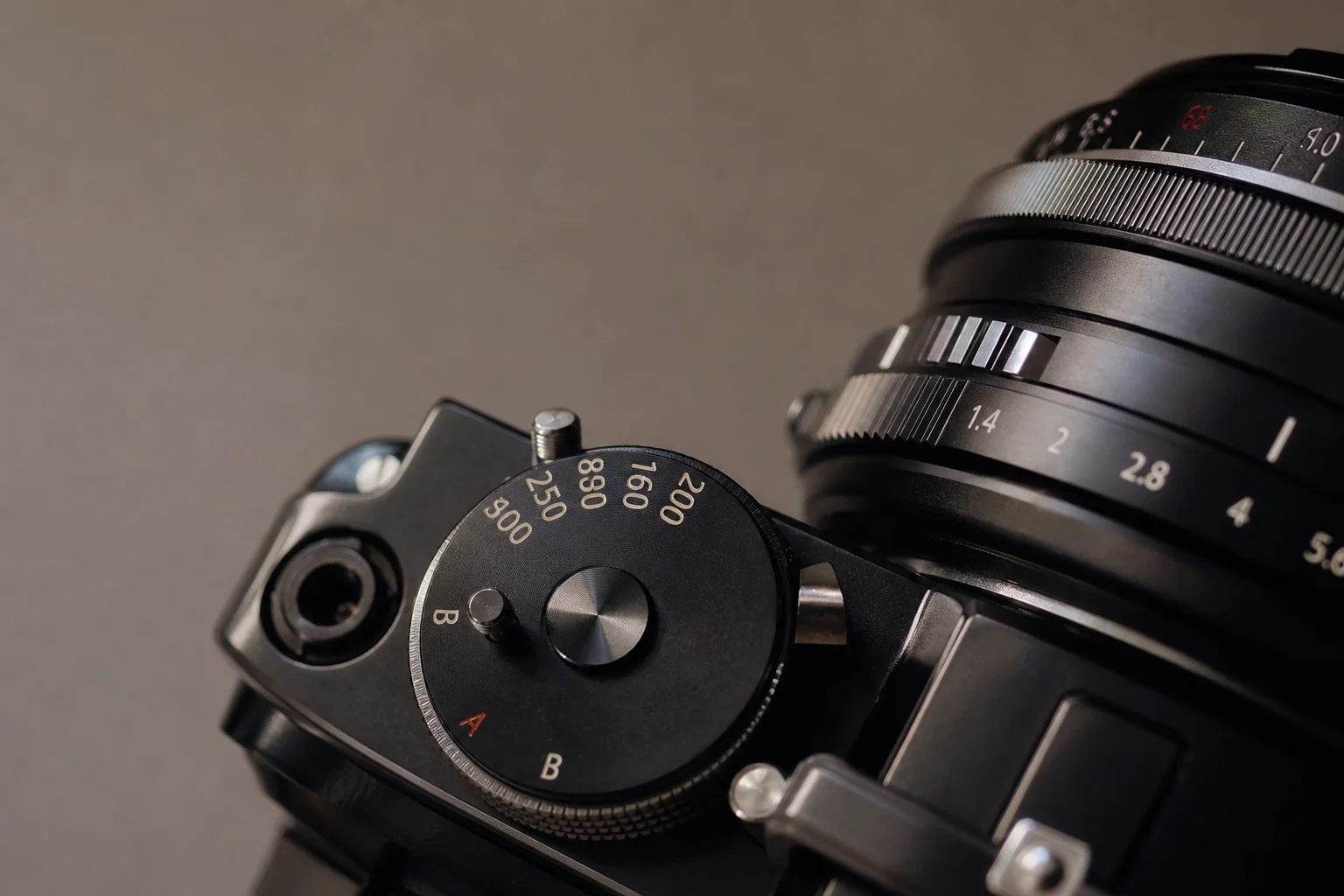 Close-up of camera shutter mechanism and mechanical dial details