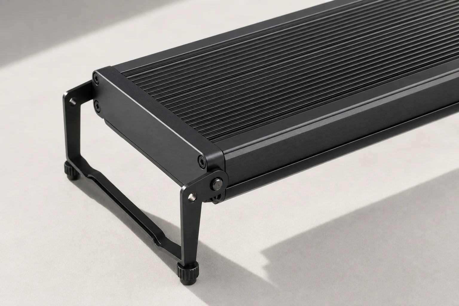 Close-up of Fzone Brite 90 metal body and adjustable mounting legs