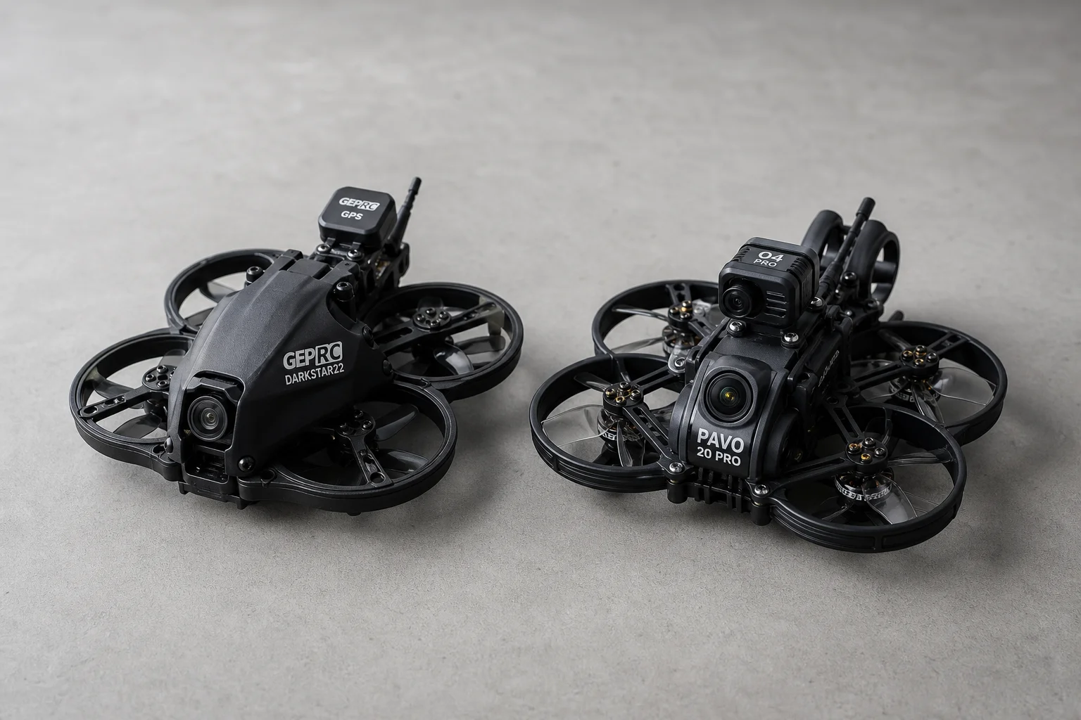 GEPRC Darkstar22 and BetaFPV Pavo20 Pro FPV cinewoops side by side on concrete