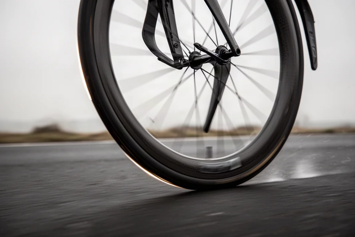Close-up of a two-piece carbon road bike cockpit with hidden brake hoses