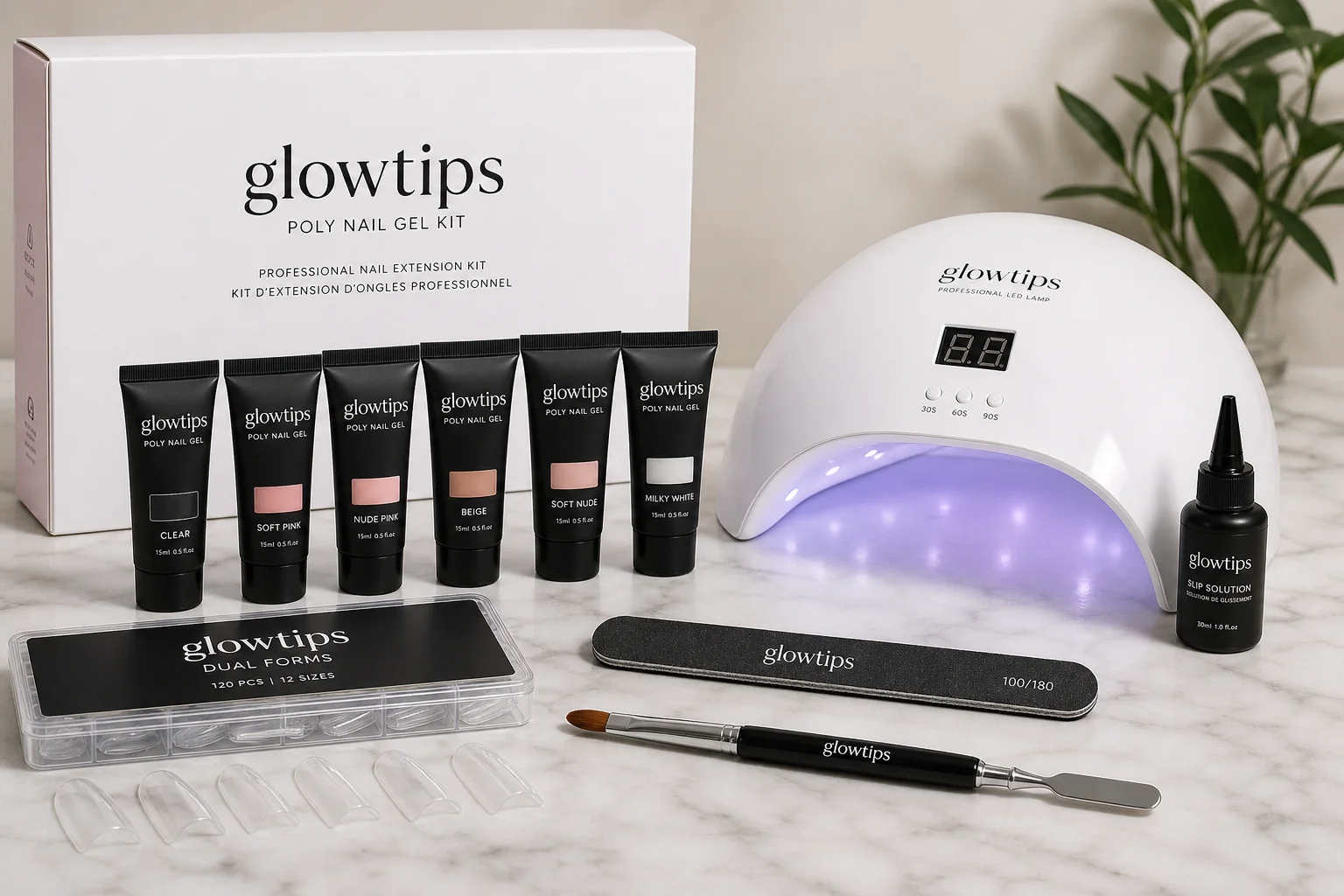 Glowtips Poly Nail Gel Kit and LED lamp components arranged on marble surface
