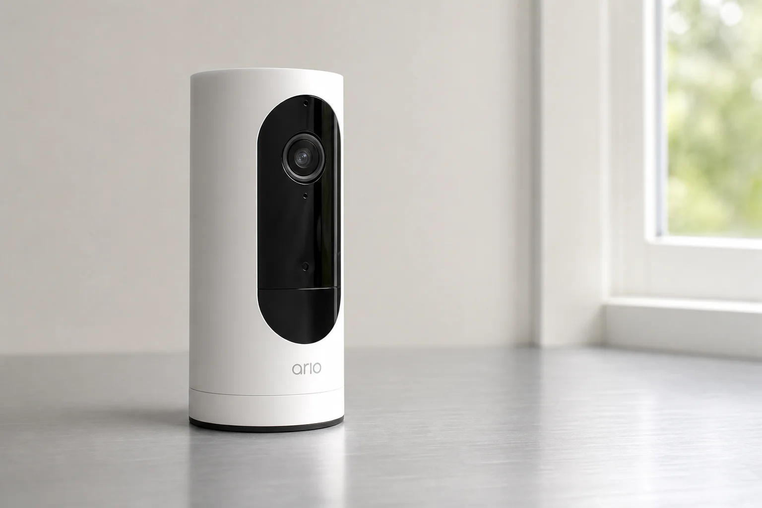 Five home security cameras arranged on concrete surface representing budget to premium options
