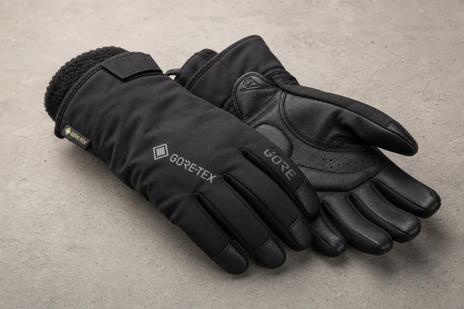 Sechs Winter-Radhandschuhe auf Beton, die das Spektrum von leicht bis stark isoliert zeigen