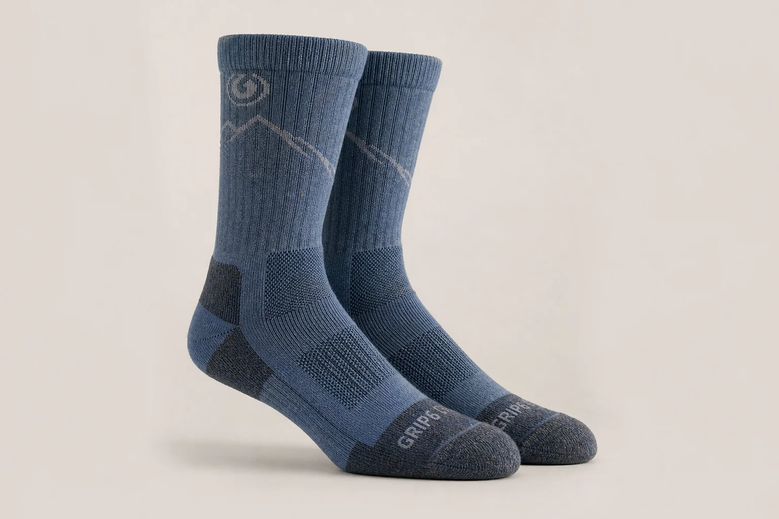 Collection of various running socks in different colors and styles on neutral backdrop